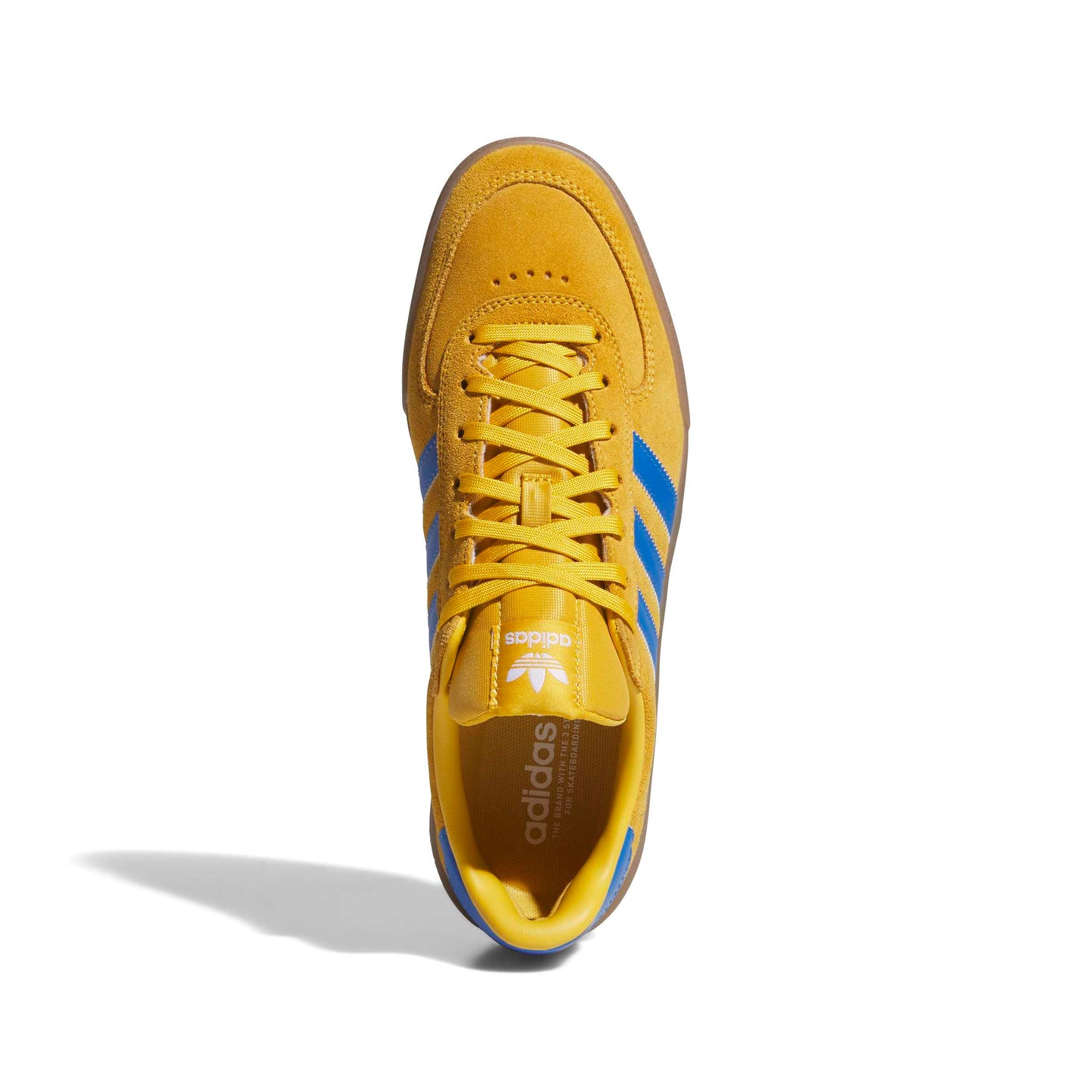 Yellow Adidas sneaker with blue accents on a white background