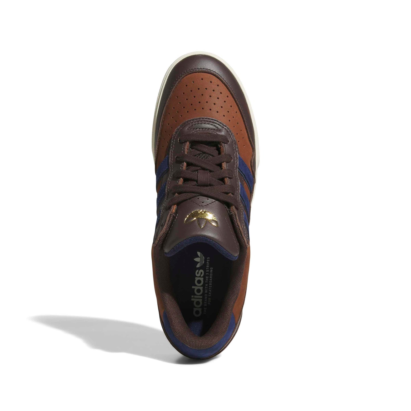 top down view of Brown and blue Adidas sneaker on a white background