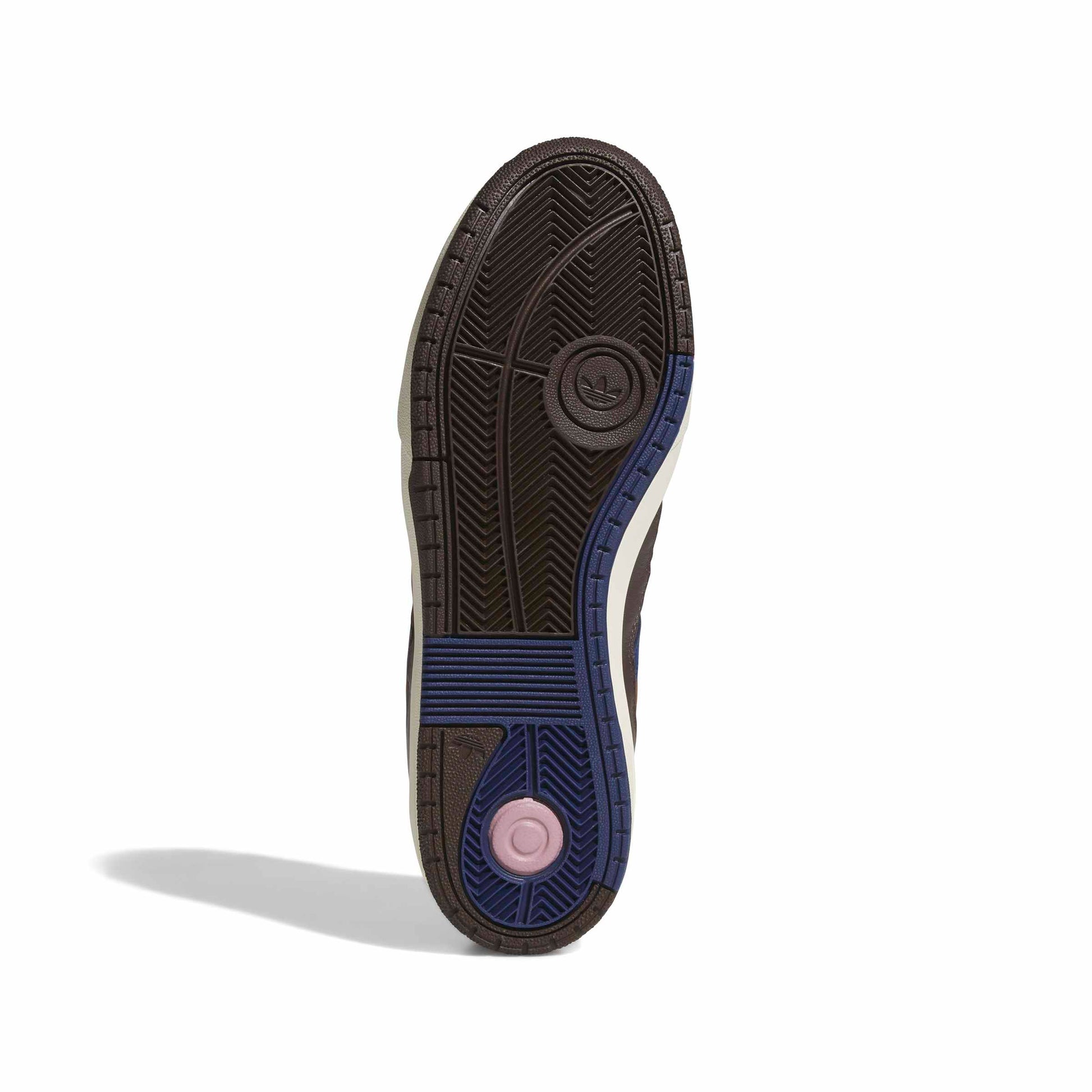 Close-up of a shoe sole with an adidas brand logo on a white background