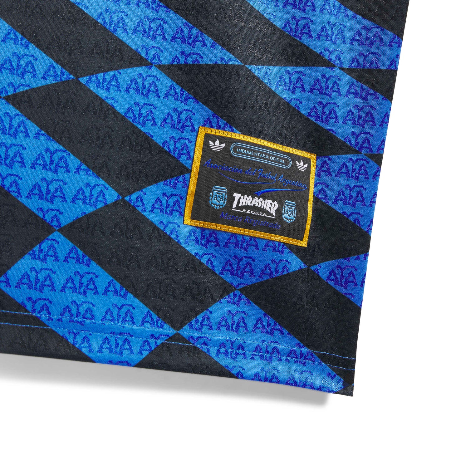 Close up with a checkered pattern and a visible brand label.