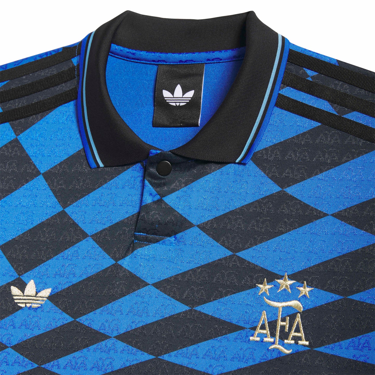 Close-up of a blue and black checkered sports jersey with Adidas logo and AFA emblem.
