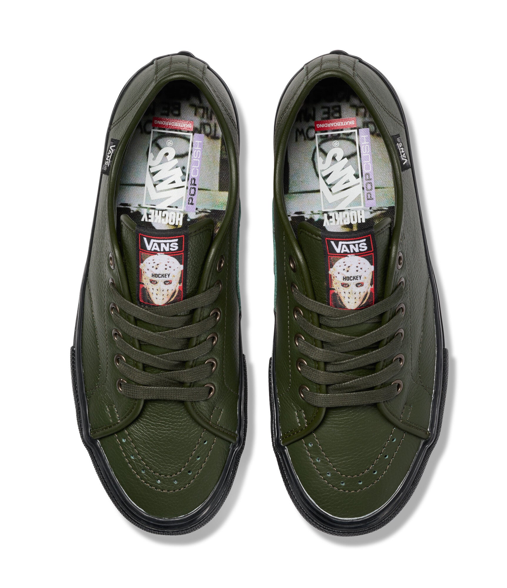 Pair of green Vans sneakers on a white background