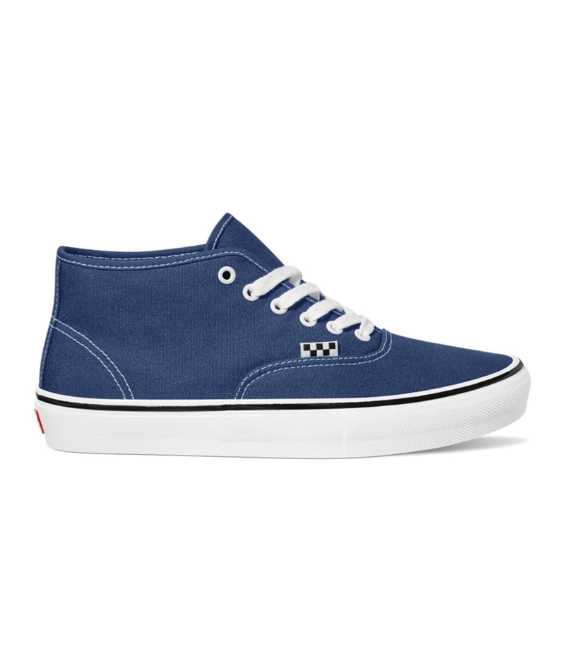 Side view of navy canvas mid top skateboard shoe from vans