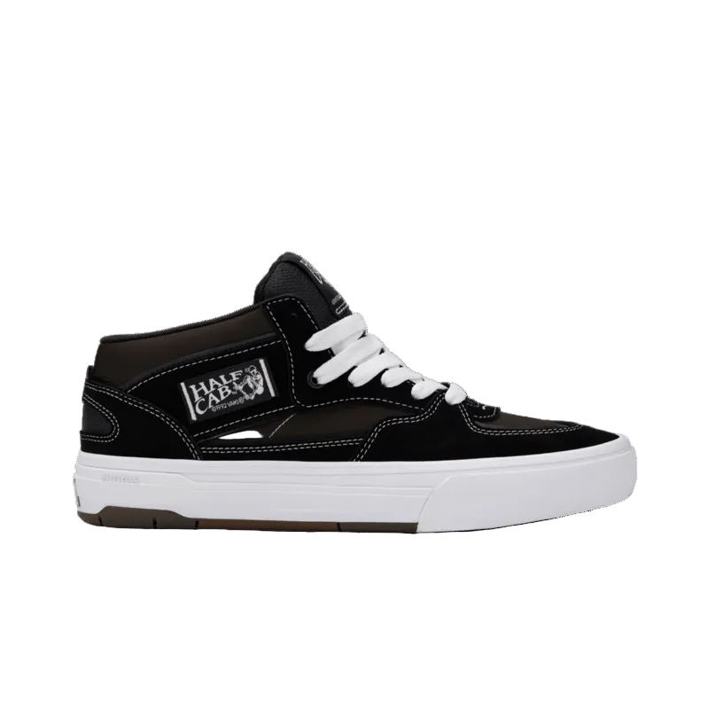Black and white sneaker with a brand logo on a white background