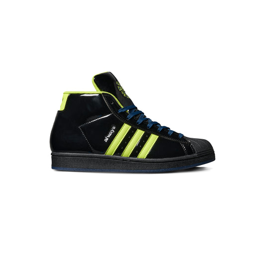 Side view of black patent leather mid top sneaker with three green stripes on side