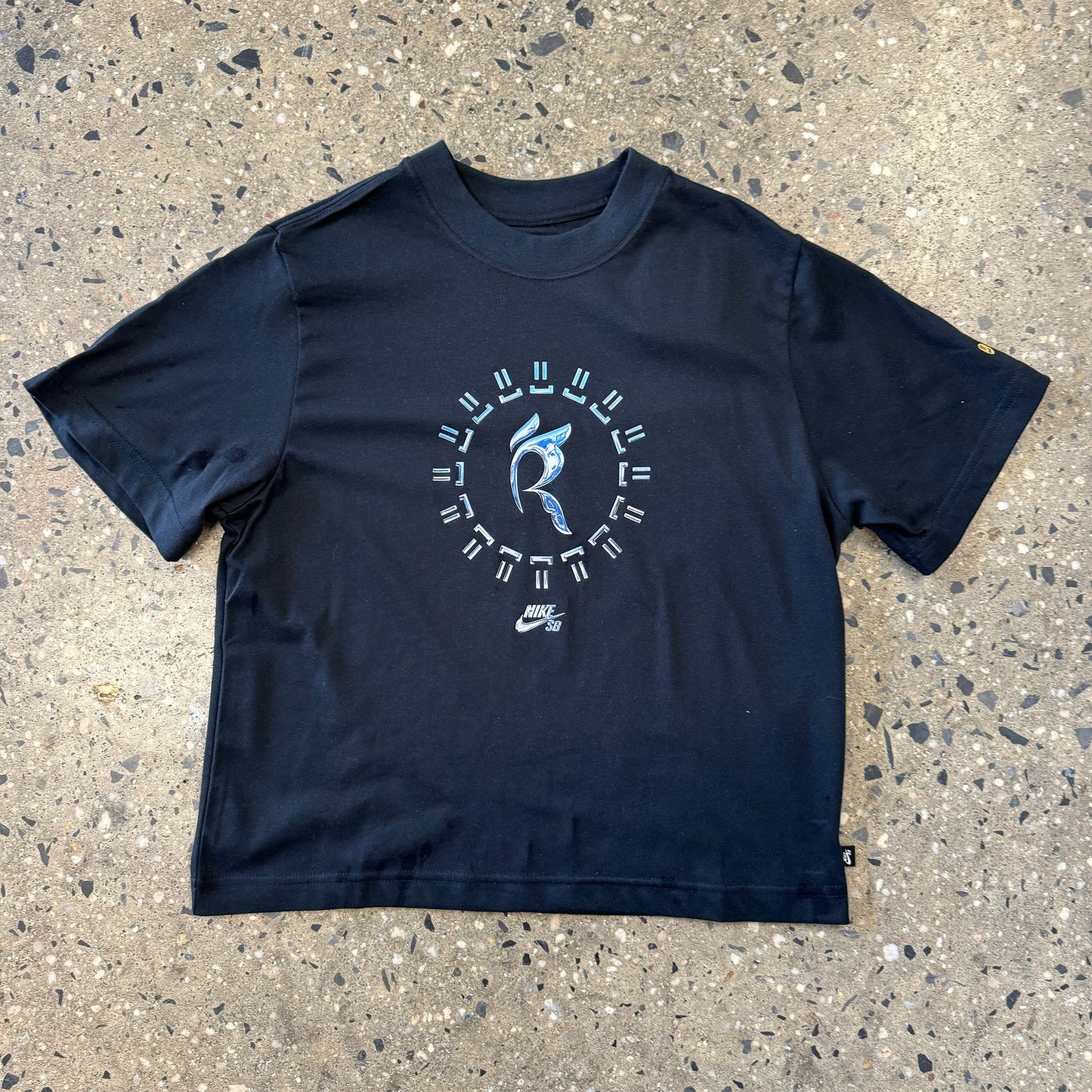 blue T-shirt with abstract logo