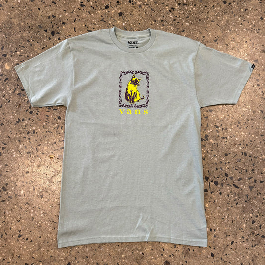 yellow and brown rectangular cat graphic on center chest of mint greet t-shirt