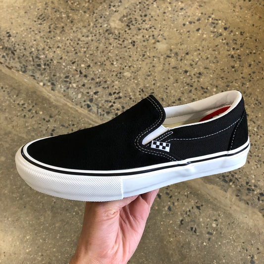 side view of black suede and canvas slip on skateboard shoe with white sole