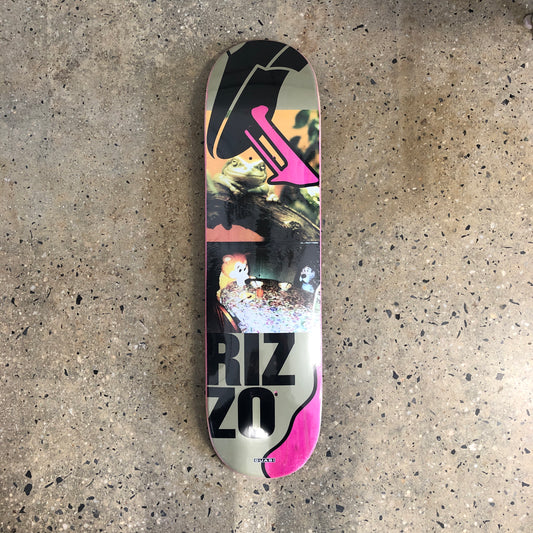 skateboard deck with photo of a frog and stuffed animals on it