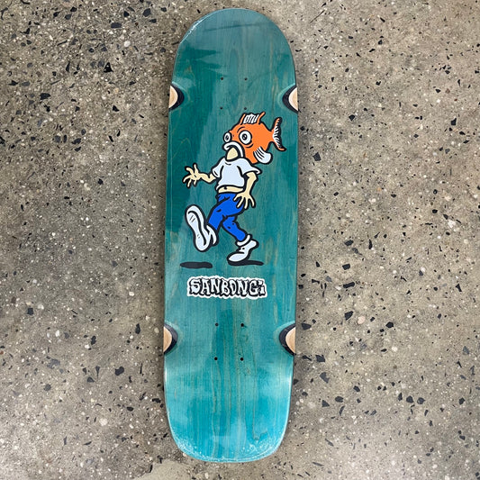 person with fish head on green wood grain skate deck (wood grain color may vary)