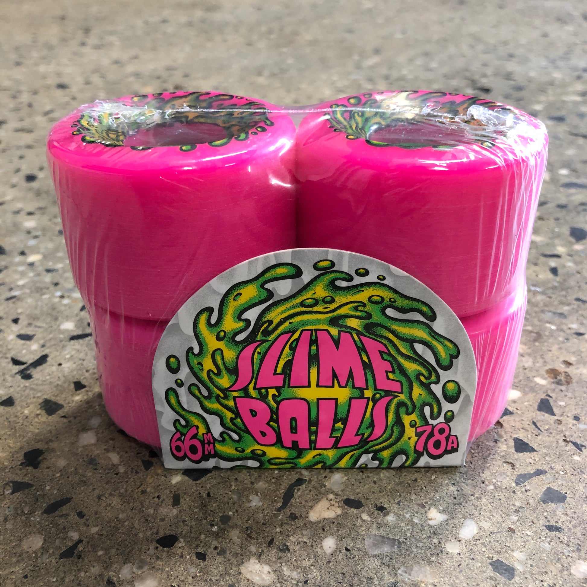 pink wheels with green and yellow design