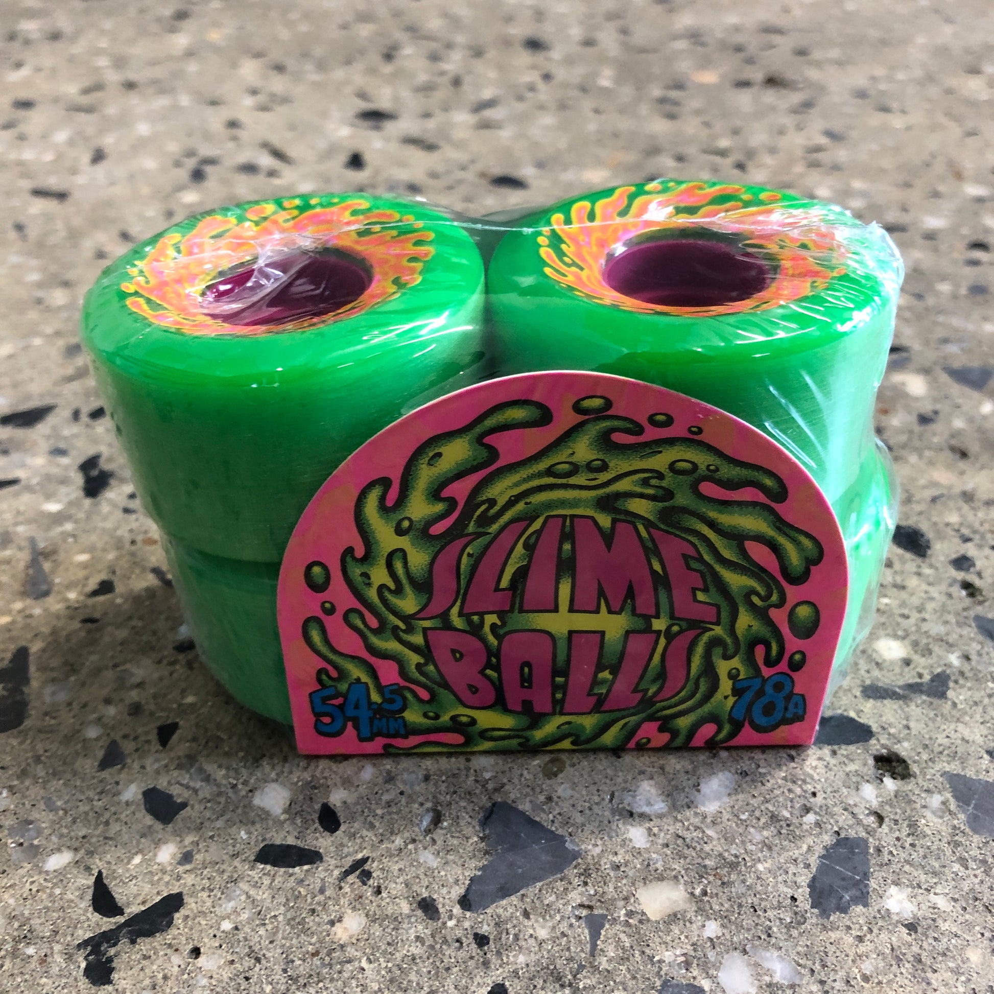 green wheels with yellow and pink design