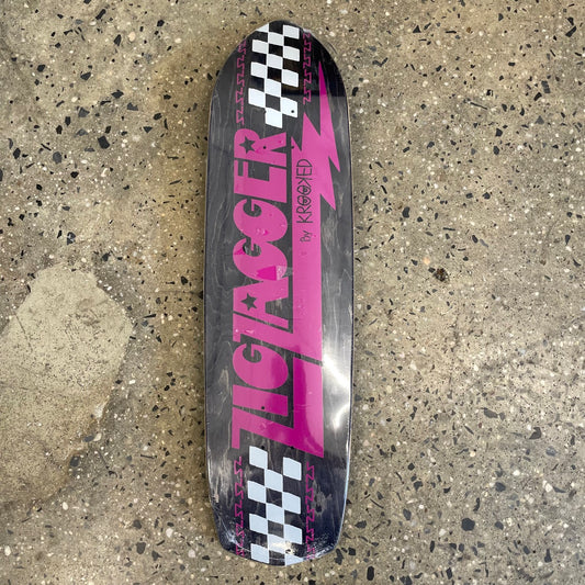 pink logo and white checkerboard on black wood grain skate deck (wood grain colors may vary)