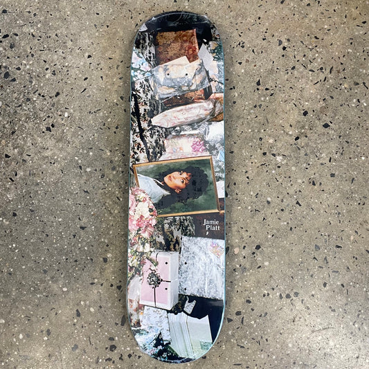 picture of woman in frame with multi color design on skate deck